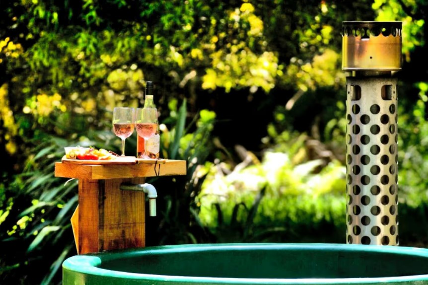 Zorb Rotorua New Zealand outdoor spa with wine glamping